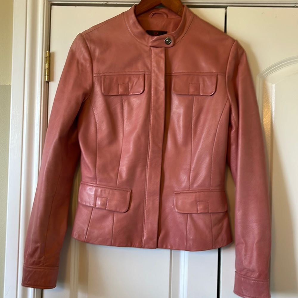 Danier pink leather jacket.  Lightly worn.    Marks as detailed in photos.  XS